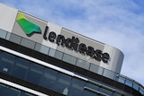 A sign on top of a building reads "lendlease". 