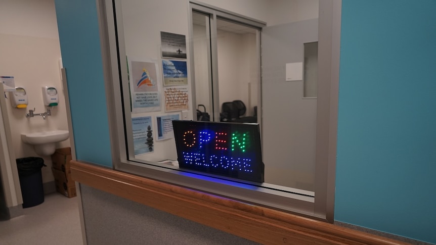 A sign says "Open, welcome"