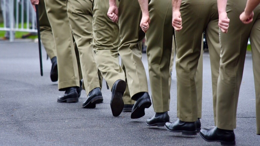 Legs of soldiers marching to the Shrine of Remembrance in Melbourne on Anzac Day, 2017.