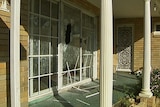 TV STILL: Home in Westmead, Sydney, where two men were doused with acid