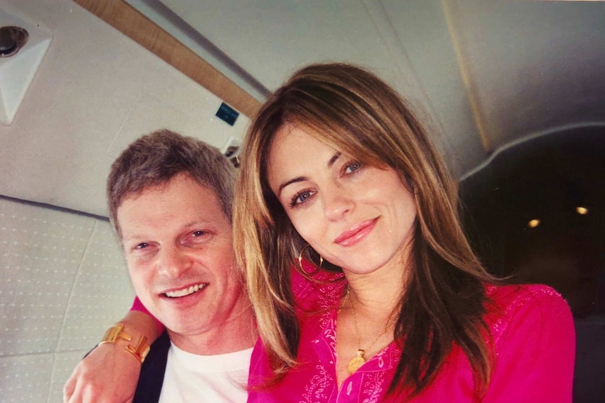 Steve Bing and Elizabeth Hurley smile in a photo posted online by Ms Hurley after his death.