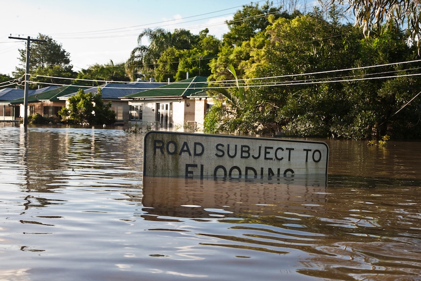 A badly flooded city street.