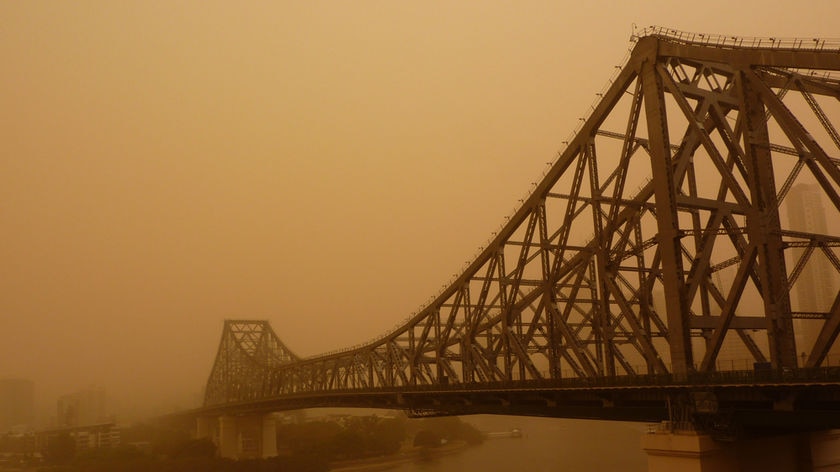 Dirty haze: Brisbane was shrouded in a cloud of dust on Wednesday.