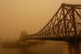 Brisbane's Storey Bridge vanishes into a haze