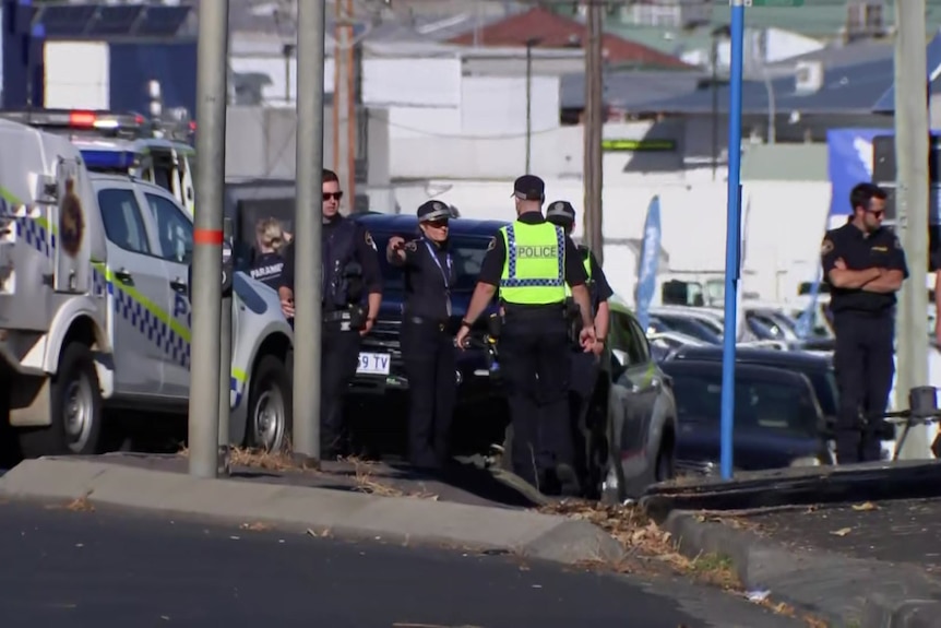 Tasmania Police at scene of a fatal crash.