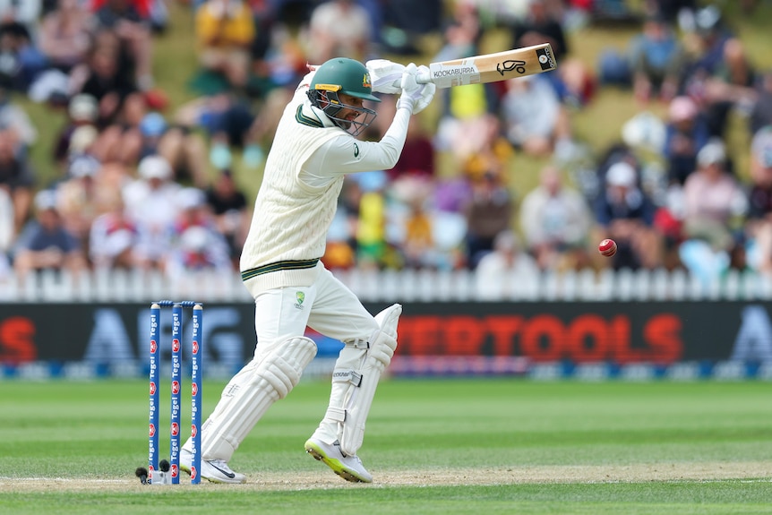 Nathan Lyon drives square of the wicket