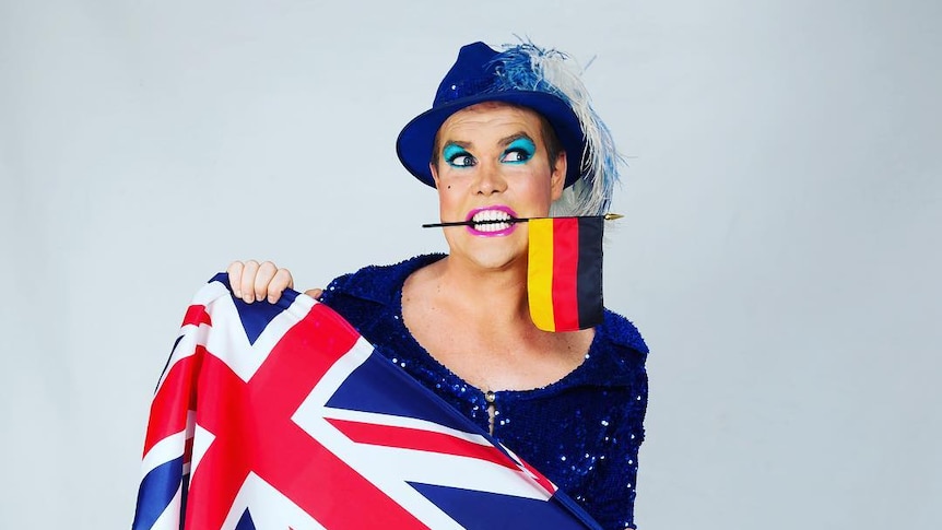 Cabaret star Hans with both Australian and German flags.