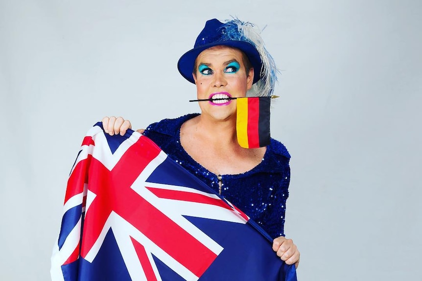 Cabaret star Hans with both Australian and German flags.