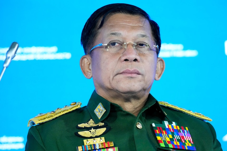 Commander-in-Chief of Myanmar's armed forces Min Aung Hlaing  wears a green uniform with golden insignia