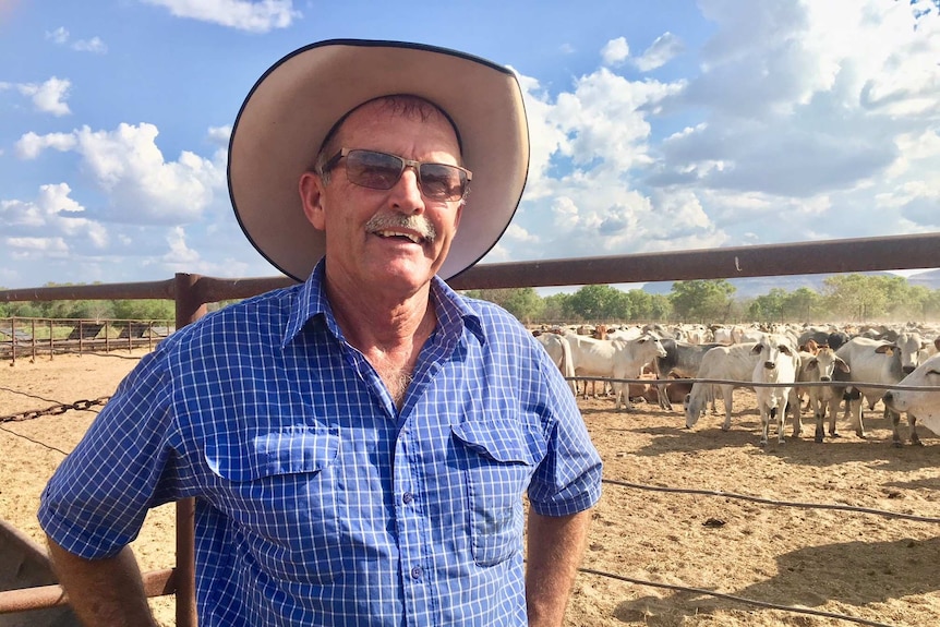 Jim Willoughby standing in front of the cattle yards at Carlton Hill Station.