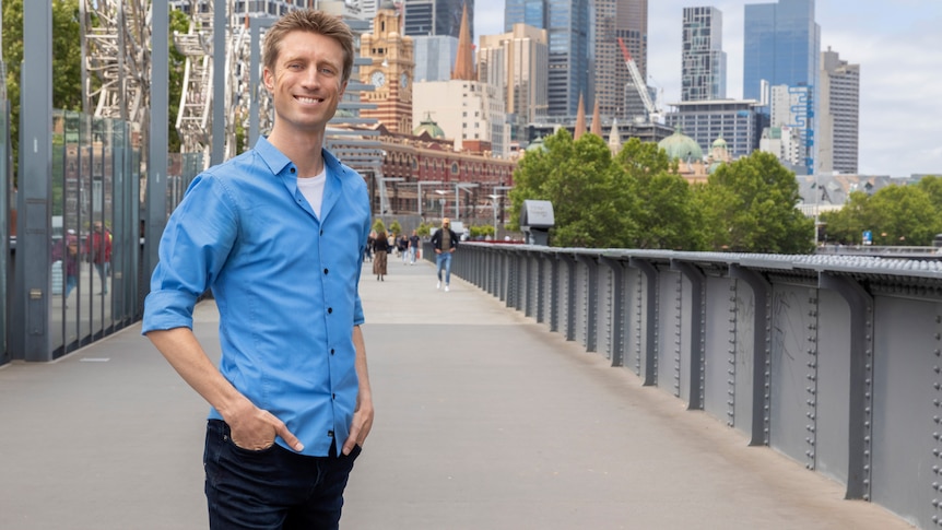 A portrait of ABC presenter and comedian Sammy J in the Melbourne city
