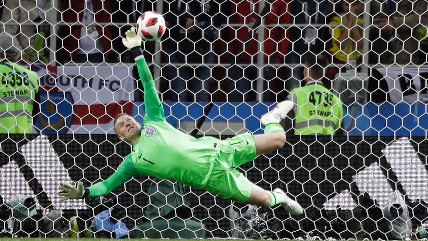 Jordan Pickford makes a big save in the penalty shootout