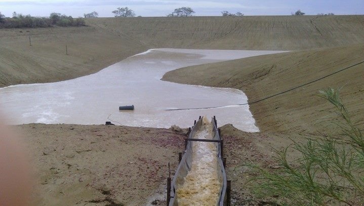 Water running into a dam at Ilfracombe in western Queensland.