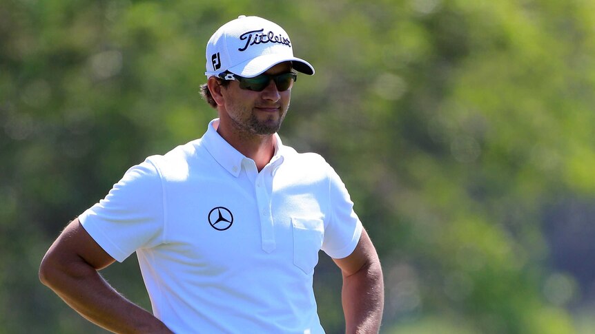 Solid display ... Adam Scott watches on during his second round