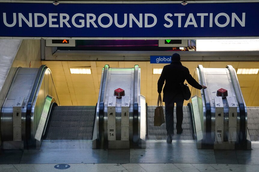 A man enters London Waterloo station