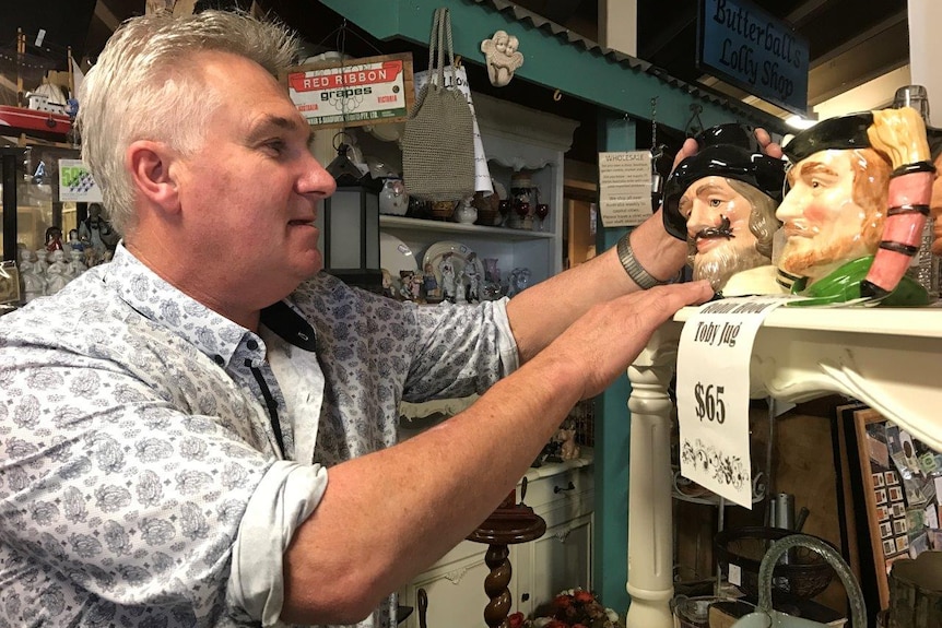 Devonport antique dealer John Cole puts new stock on display