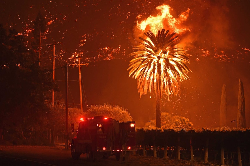 A fire truck heads towards a California wildfire.