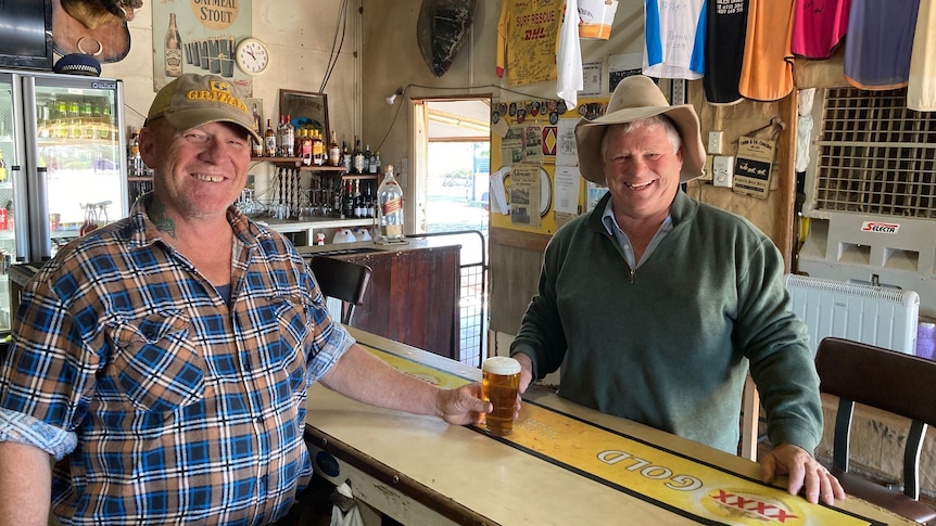 Two men at bar of a country pub