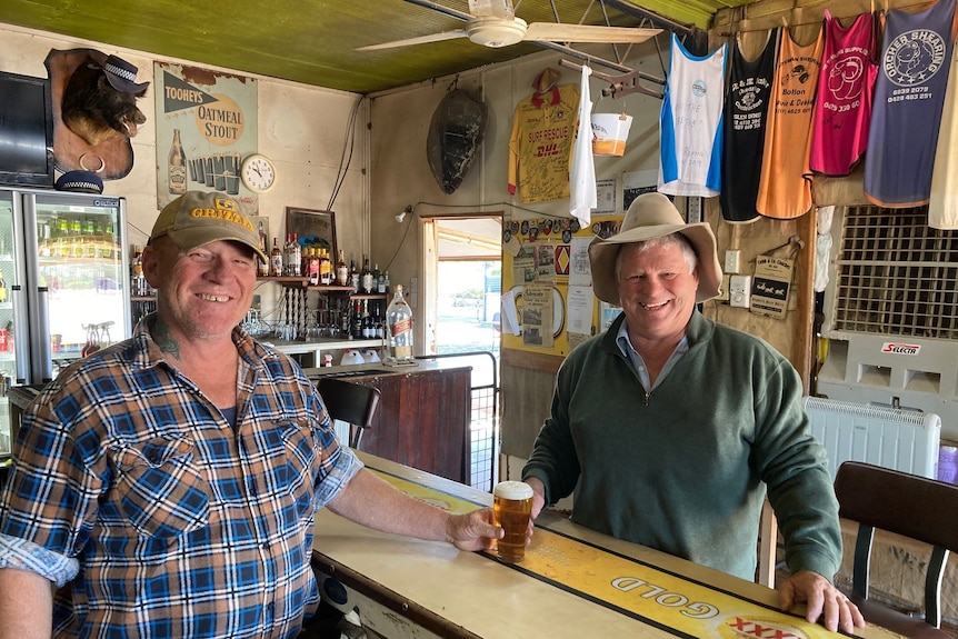 Two men at bar of a country pub