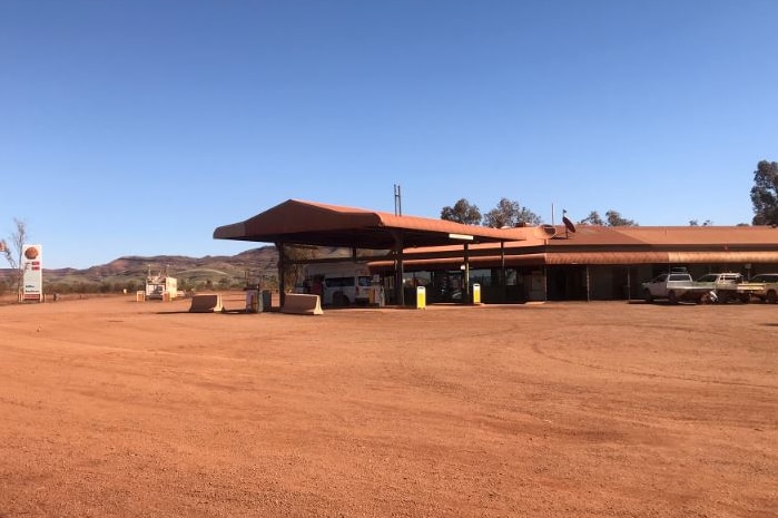 The exterior of a remote roadhouse.