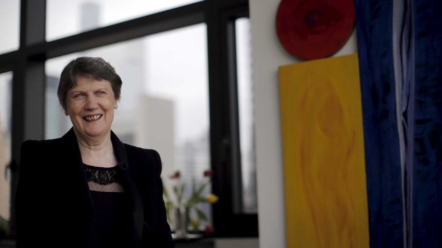 You view Helen Clark in a loft-style apartment surrounded by modernist artworks on an overcast day.