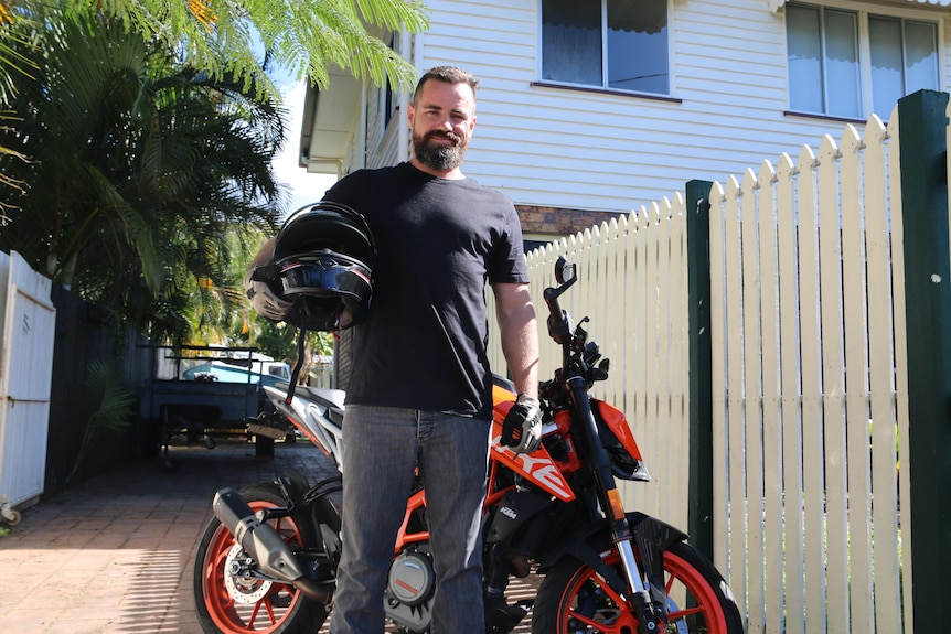 Joe Bridge with his motorbike.