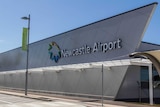 Exterior shot of the Newcastle Airport sign.
