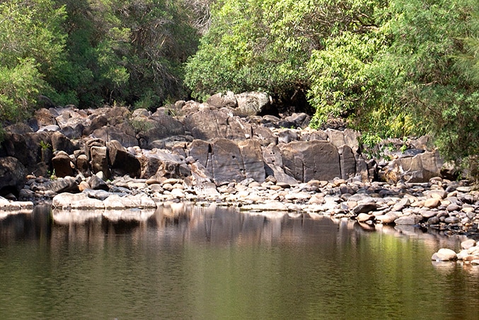 A river setting with stepped rock formations during dry conditions.