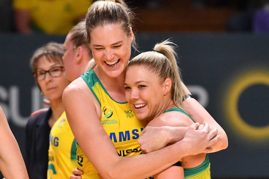 Kate Moloney of Australia celebrates win with Caitlin Bassett.