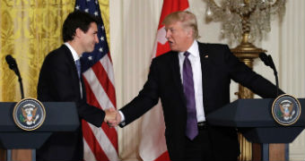 President Donald Trump shakes hands with Canadian Prime Minister Justin Trudeau