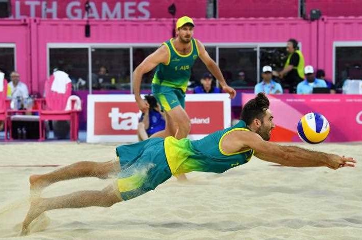 Christopher McHugh and Damien Schumann during the mens beach volleyball gold medal match.