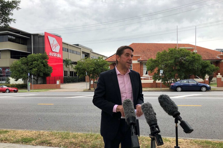 Queensland state development minister Cameron Dick outside Virgin Australia's head office in Brisbane.