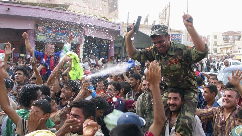 Iraqis celebrate in the streets