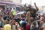 Iraqis celebrate in the streets