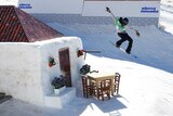 Australian snowboarder Tess Coady jumps on the slopestyle course at FIS Snowboarding world titles.
