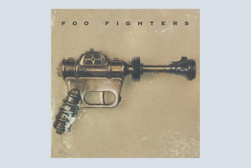 A futuristic-looking firearm with the words "Foo Fighters" printed above it