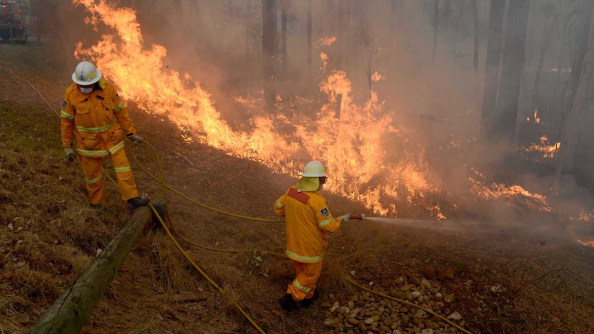 Crews work to protect properties west of Sydney