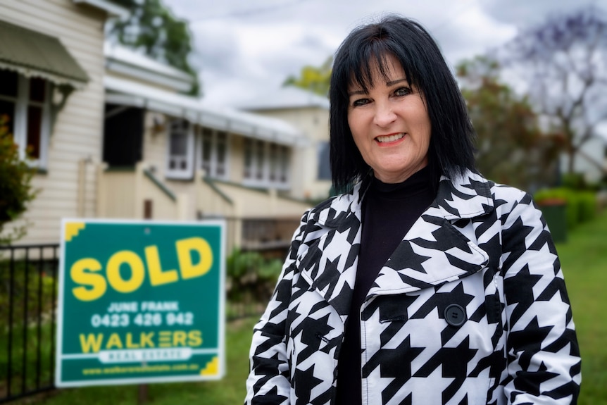 Ipswich real estate agent June Frank outside a house that has just been sold