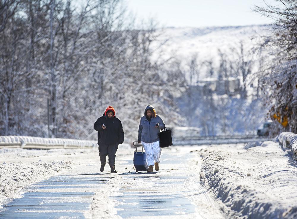 Motorists trapped for 20 hours on an impassable stretch of highway as ...