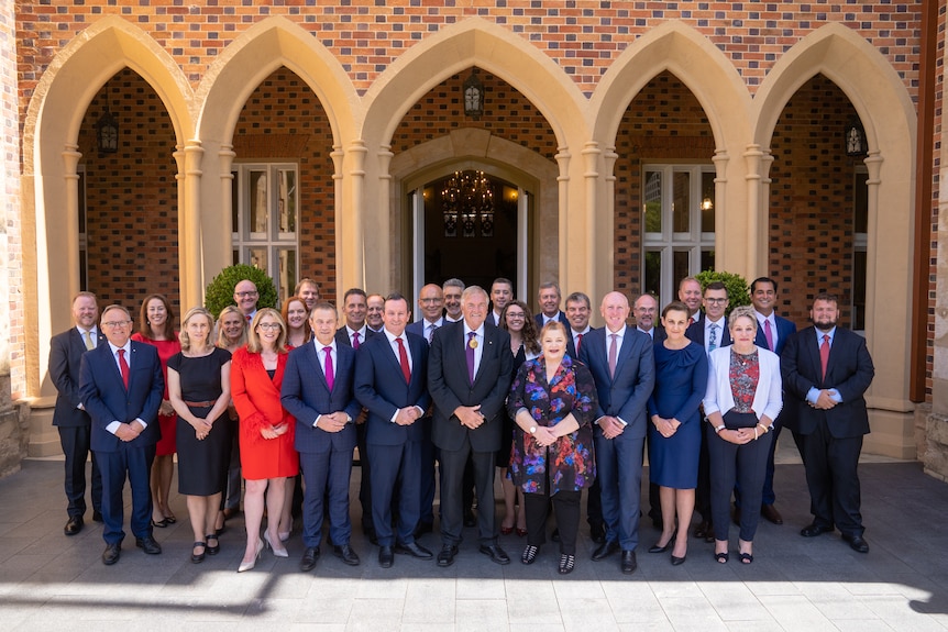 A group shot of the WA Cabinet members outside Government House