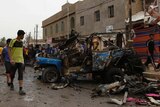 The site of a car bomb attack at the Kamaliya district in Baghdad