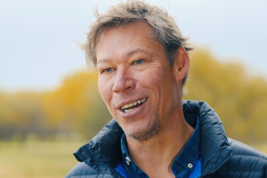 A close up shot of a man looking off camera. 