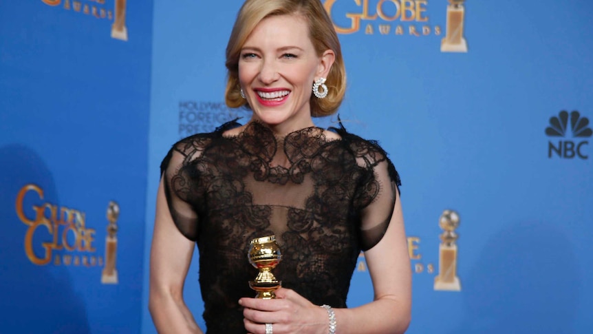 Cate Blanchett shows off her Golden Globe for best actress.