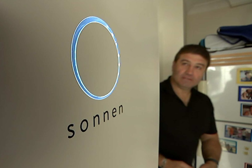 Stephen Fenech looks at his Sonnen battery.