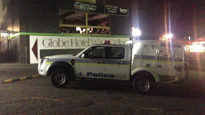 Police outside the Globe Hotel in Hobart.
