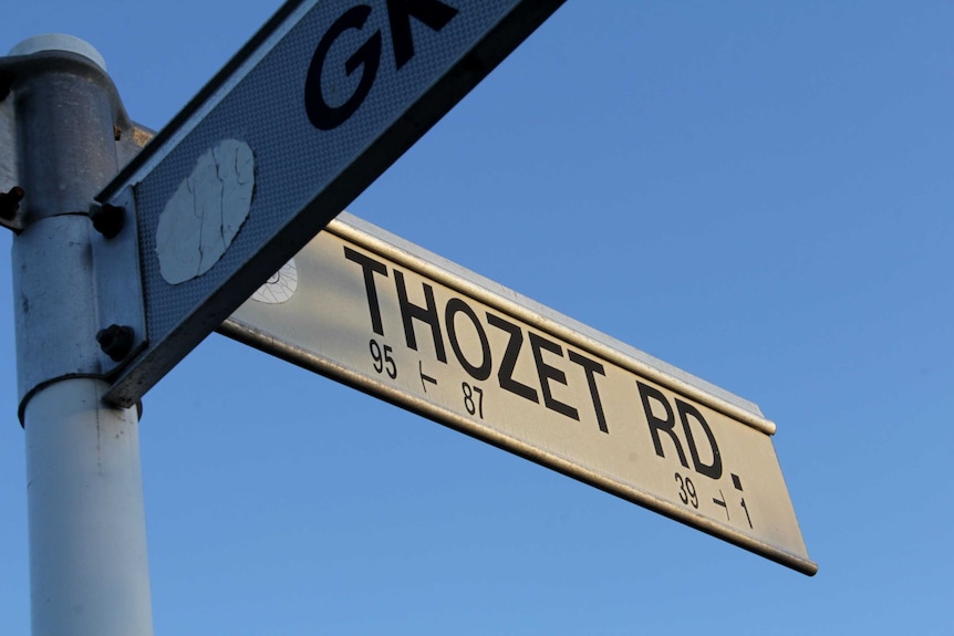 Thozet Road sign.