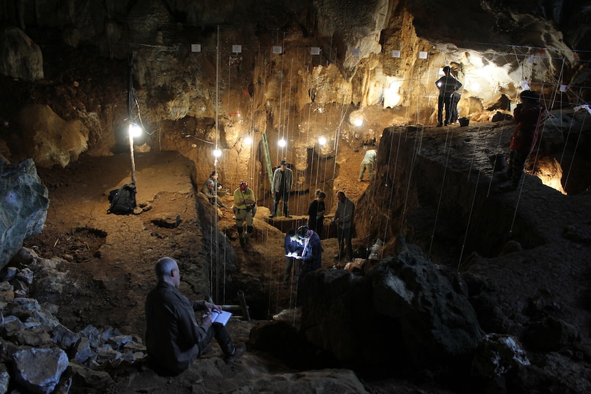 The Tam Pa Ling team at work in the cave with lights