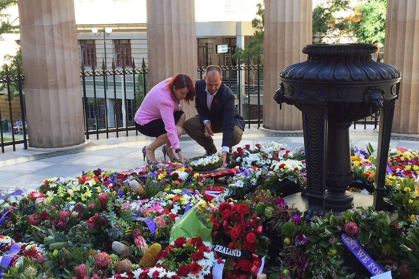 Australian journalist Peter Greste lays a wreath at Brisbane's Shrine of Remembrance