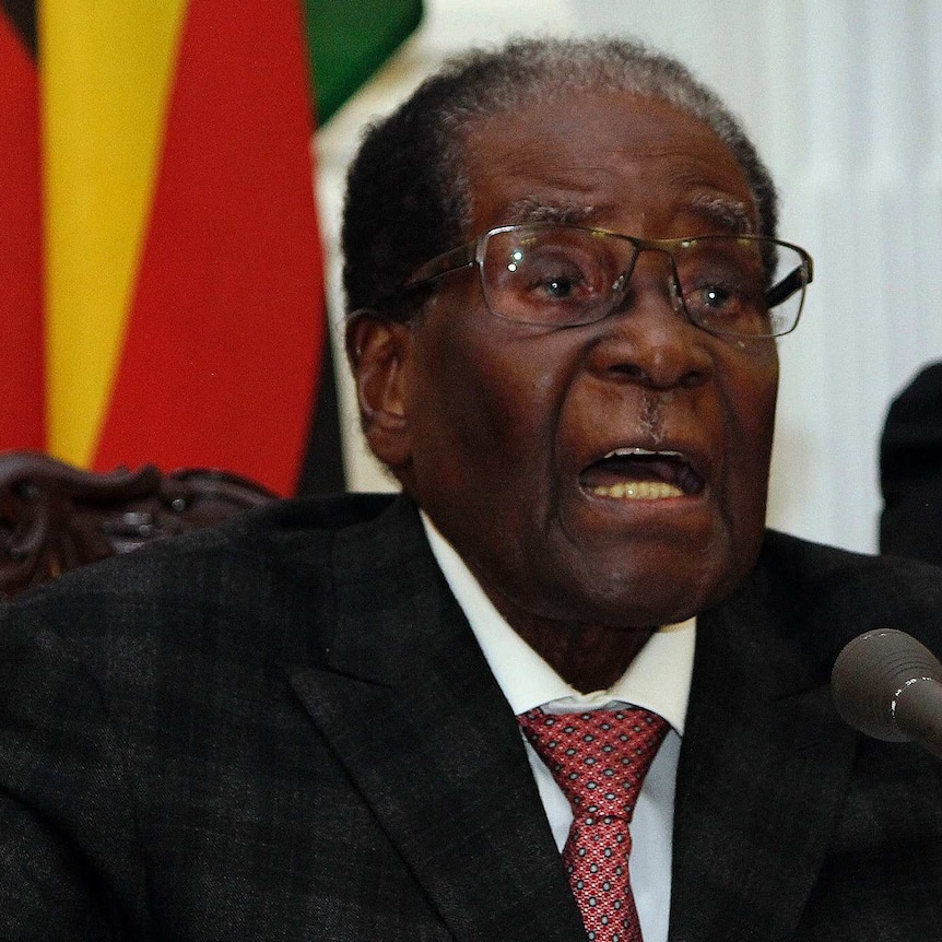 Robert Mugabe delivers his speech during a live broadcast at State House in Harare.