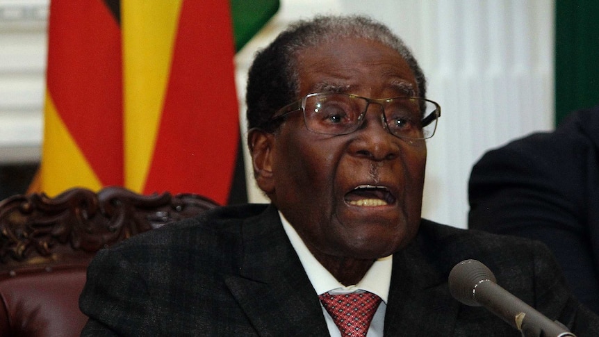 Zimbabwean President Robert Mugabe delivers his speech during a live broadcast at State House in Harare, Sunday, Nov, 19, 2017. Zimbabwe's President Robert Mugabe has baffled the country by ending his address on national television without announcing his resignation.